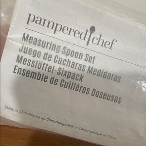 Pampered Chef Multi-Language Measuring Spoon Set